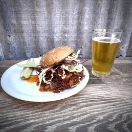 Pork sandwich and beer. In a full stomach there is not room for sadness ! Pork sandwich and beer. In a full stomach there is not room for sadness !
