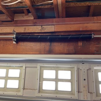 First Garage Door - Tension spring of the side mount garage door opener. - Garage Door Services Near Me - Irvine, California