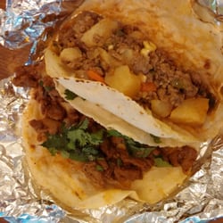 Taqueria Castillo - Picadillo and beef fajita tacos on their delicious corn.