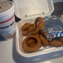 Double cheeseburger, onion rings, hush puppies and a chocolate shake Double cheeseburger, onion rings, hush puppies and a chocolate shake