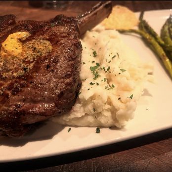 Becks - 16 oz cowgirl ribeye with mashed potatoes and asparagus - Seafood Near Me - Augusta, Georgia