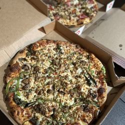 Domino's Pizza - This is supposed to be a veggie pizza, but they messed it up. It was still good tho! Peppers, garlic, SAUSAGE, mushrooms and garlic...?