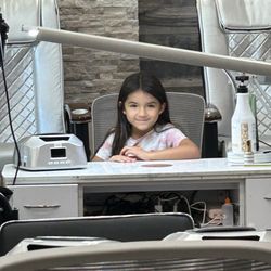 Shine A Nail Boutique - My beautiful granddaughter waiting for her nails to be painted.