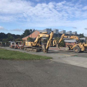 Wahlund Construction - a couple of backhoes parked on the side of the road - General Contractors Near Me - Eureka, California Wahlund Construction - a couple of backhoes parked on the side of the road - General Contractors Near Me - Eureka, California