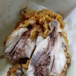 This is what I found when I bit into a piece of Royal Farms chicken!! This was nasty bloody taste, possibly old.