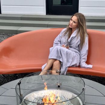 Inns of Aurora Resort & Spa - Outside fireplace with heated benches (wine costs $) - Resorts Near Me - Aurora, New York