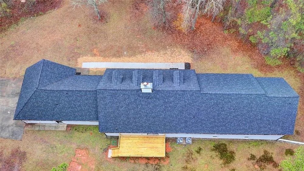 Slide of Red Bull Roofing Solutions