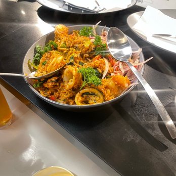 Julia & Henry's - First floor paella with white wine - Food Court Near Me - Miami, Florida
