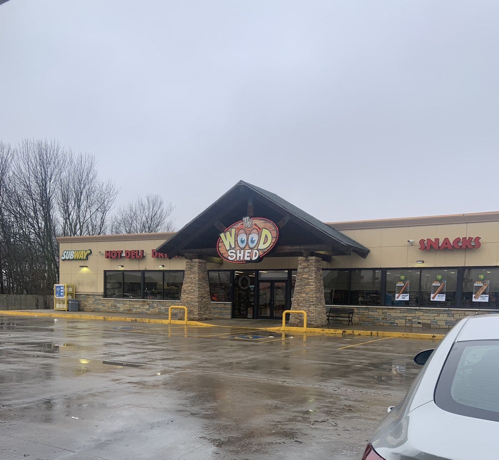 Woodshed Convenience Stores Logo