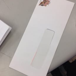 They taped the window of the envelope closed because they can't provide a windowless stamped envelope...damn shame.