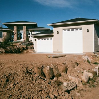 JPM Garage Builders - two garages in the foreground - General Contractors Near Me
