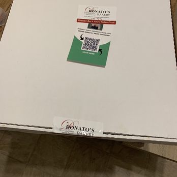 Donato's Bakery - a pizza box on a table - Bakeries Near Me - Thunder Bay, Ontario