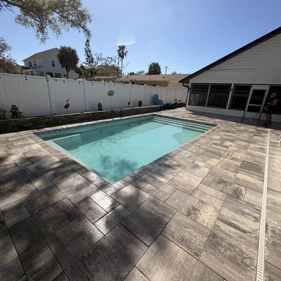 Backyard Oasis Sand n Seal Transformation - Our client wanted their pool area to look as fresh as the day it was built. We delivered a total transformation with our thorough cleaning and restoration process. Every inch was treated with care—from removing unsightly weeds and grime to restoring the vibrant look of the pool deck.