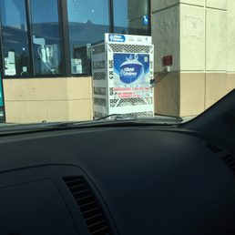a vending machine in front of a building
