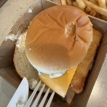 McDonald's - Lopsided Filet-O-Fish with the extra half slice of cheese added in. No one bothered to center the fish patty when they added the cheese... - Coffee & Tea Near Me - Pearl City, Hawaii