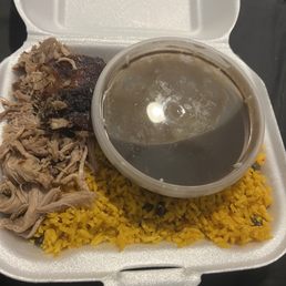 Roasted pork, yellow rice, black beans. Roasted pork, yellow rice, black beans.