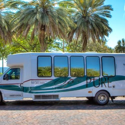 Pure Limousine - White Limo Bus
