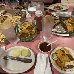 Barria pizza and chips and bean dip