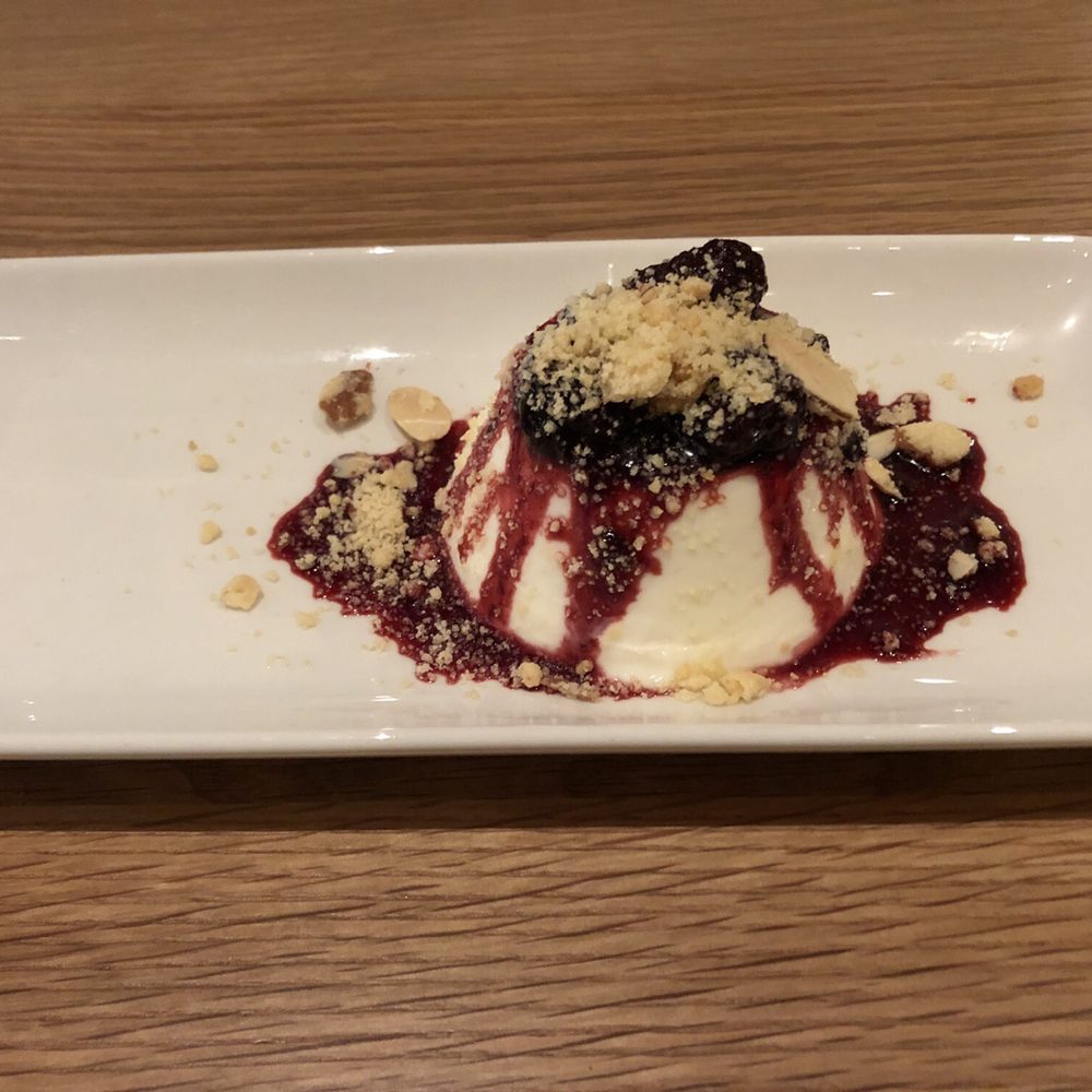 Cortina - Buttermilk panna cotta, blackberry lemon-thyme, candied almonds - Italian Near Me - Seattle, Washington Cortina - Buttermilk panna cotta, blackberry lemon-thyme, candied almonds - Italian Near Me - Seattle, Washington