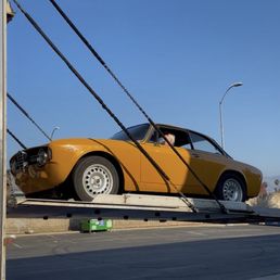 Car being unloaded Car being unloaded