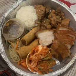 Lechon Kawali with karage chicken 1 scoop rice, kimchee and japchae noodles.  The plates also came with 2 veggie lumpia.