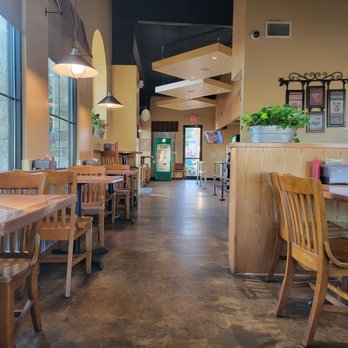 Pecan St. Station Deli & Grill - the dining area - Delis Near Me - Pflugerville, Texas