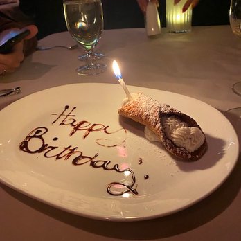 Piero's Italian Cuisine - A birthday cannoli on the house. - Italian Near Me - Las Vegas, Nevada Piero's Italian Cuisine - A birthday cannoli on the house. - Italian Near Me - Las Vegas, Nevada