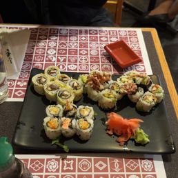 a plate of sushi rolls a plate of sushi rolls