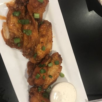 Brick Oven Pizza - Red Hot Wings -- 5/5 super yummy, lots of green onions and a pool of ranch. delicious!! - Pizza Near Me - Kapolei, Hawaii Brick Oven Pizza - Red Hot Wings -- 5/5 super yummy, lots of green onions and a pool of ranch. delicious!! - Pizza Near Me - Kapolei, Hawaii