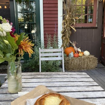 Boulangerie- A Proper Bakery - Cheese Danish seated outside with Fall Decor - Bakeries Near Me - Kennebunk, Maine Boulangerie- A Proper Bakery - Cheese Danish seated outside with Fall Decor - Bakeries Near Me - Kennebunk, Maine