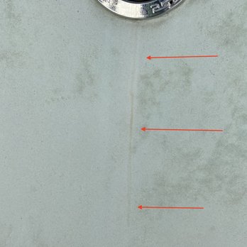 Supreme Pool Tile Cleaning - Photo of the stain underneath the Pool light now. - Pool Cleaners Near Me - La Quinta, California
