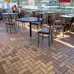 McDonald's - Dining room area is filthy, unorganized, and floor are sticky.