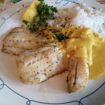 Restaurant In't Dörp - Seelachs mit Reis in Currysouce - Restaurants Near Me - Langeoog, NI Restaurant In't Dörp - Seelachs mit Reis in Currysouce - Restaurants Near Me - Langeoog, NI