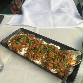 Saffron Kitchen - AUSHAK, chive dumplings with meat sauce - Mediterranean Near Me - Oakland, California Saffron Kitchen - AUSHAK, chive dumplings with meat sauce - Mediterranean Near Me - Oakland, California
