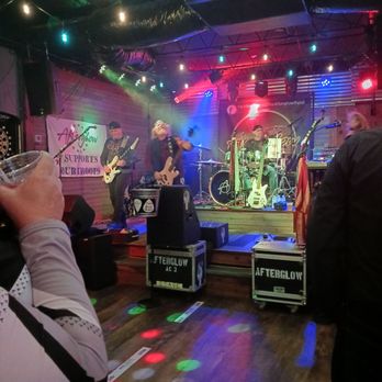 Garage Bar - a band playing on stage - Dive Bars Near Me - Saint Cloud, Florida Garage Bar - a band playing on stage - Dive Bars Near Me - Saint Cloud, Florida