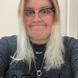 The after showing my destroyed hair still tinted blue and now leaving a "line" across my hair from bleach