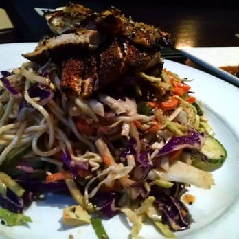 Yard House - THAI CHICKEN NOODLE  egg noodles, asian slaw, cucumbers, spicy peanut vinaigrette - New American Near Me - Costa Mesa, California
