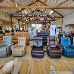 SC41 Furniture & Mattresses - A view of SC41's expansive yet cozy showroom featuring the recliner section