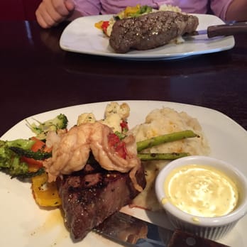 Bâton Rouge Steakhouse & Bar - The Oscar! 7oz Filet Mignon, 6oz lobster w garlic butter, garlic mashed potatoes, seasonal veggies,asparagus & hollandaise sauce - Steakhouses Near Me - Halifax, Nova Scotia Bâton Rouge Steakhouse & Bar - The Oscar! 7oz Filet Mignon, 6oz lobster w garlic butter, garlic mashed potatoes, seasonal veggies,asparagus & hollandaise sauce - Steakhouses Near Me - Halifax, Nova Scotia