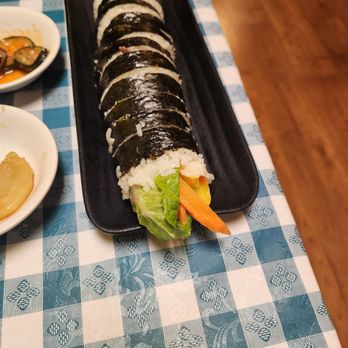 Choi's Restaurant - a plate of sushi and a plate of vegetables - Korean Near Me - College Station, Texas