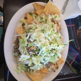 33. Nachos Supremos with extra lettuce 33. Nachos Supremos with extra lettuce