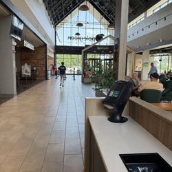 Applegreen - Open center court with restaurants and bathrooms on the right and left.