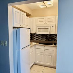 Navy Lodge - Since we were in a kitchenette, we also had a big fridge with freezer, countertop stove, microwave, coffee maker, pots, pans, dishes, and