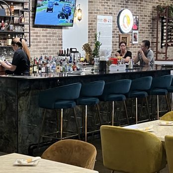 The Nine Heathrow Thai Grill & Kitchen - Well-stocked premium bar with top shelf favs. - Thai Near Me - Heathrow, Florida The Nine Heathrow Thai Grill & Kitchen - Well-stocked premium bar with top shelf favs. - Thai Near Me - Heathrow, Florida