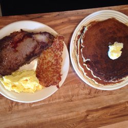 Stockyard Diner - Ribeye steak and eggs and our sweet cream pancakes.