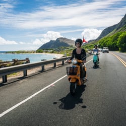 Hawaiian Style Rentals & Sales - Riding the Genuine Buddy, our standard basket moped rental, on the east side of Oahu.
