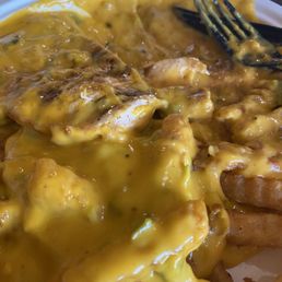 Hatch poutine? Succulent chicken breast over fries smothered in green chilis and real cheese Hatch poutine? Succulent chicken breast over fries smothered in green chilis and real cheese