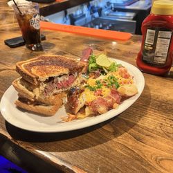 The High Horse Saloon & Eatery - Steak Rueben with loaded hot crushed potatoes