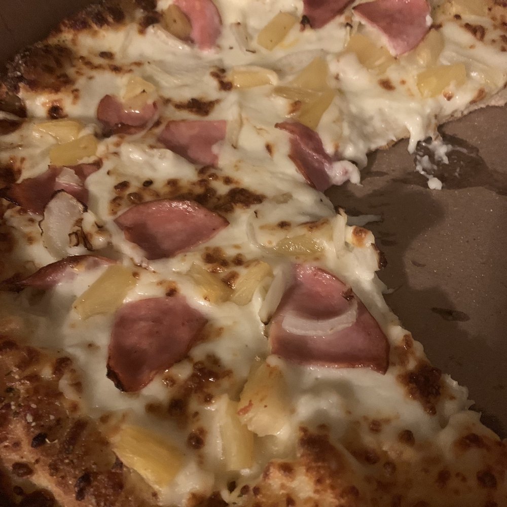 Hand tossed crust, garlic Parmesan sauce, ham, pineapple and onions Hand tossed crust, garlic Parmesan sauce, ham, pineapple and onions