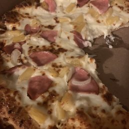 Hand tossed crust, garlic Parmesan sauce, ham, pineapple and onions Hand tossed crust, garlic Parmesan sauce, ham, pineapple and onions
